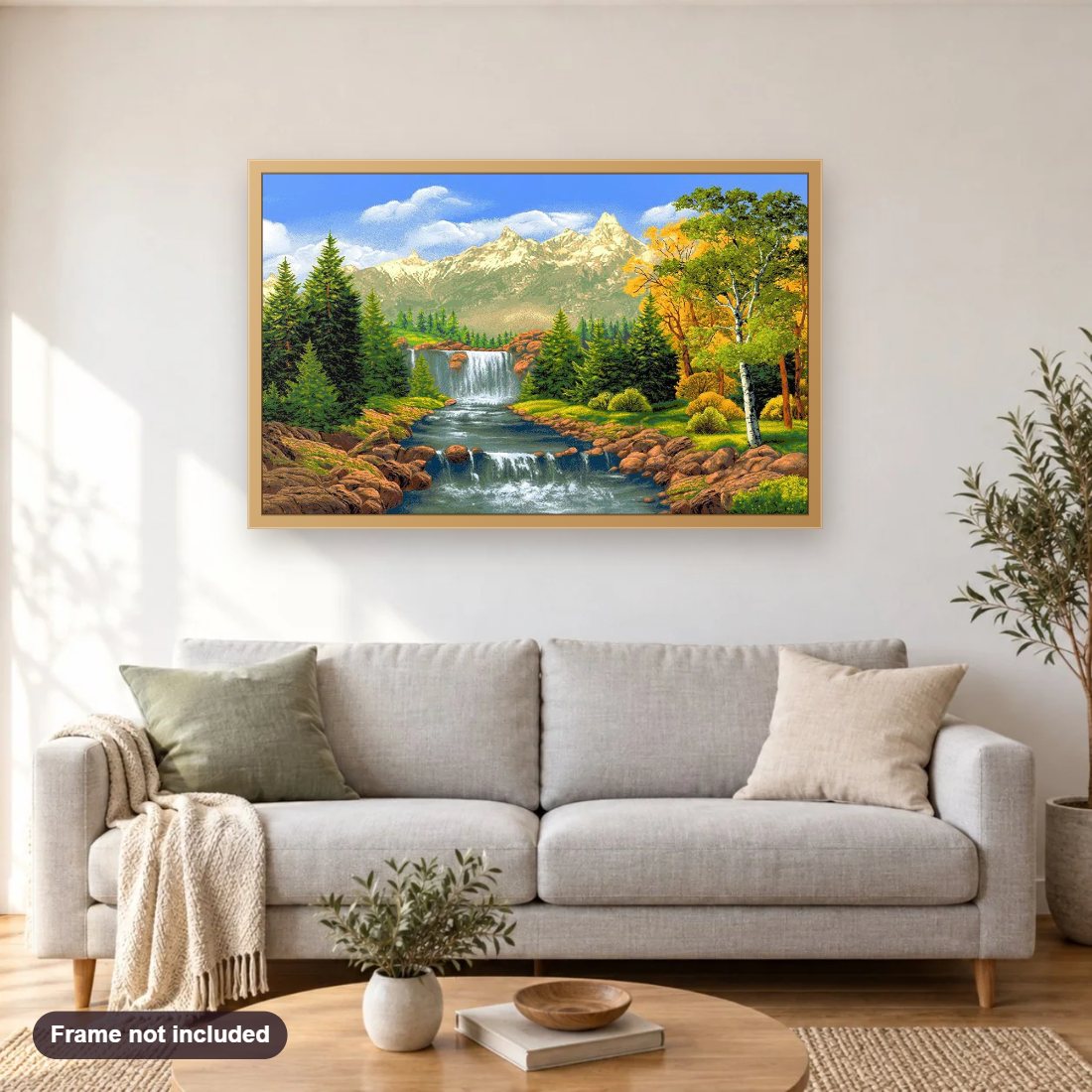 Mountains Stream diamond painting shown framed on a living room wall above a sofa