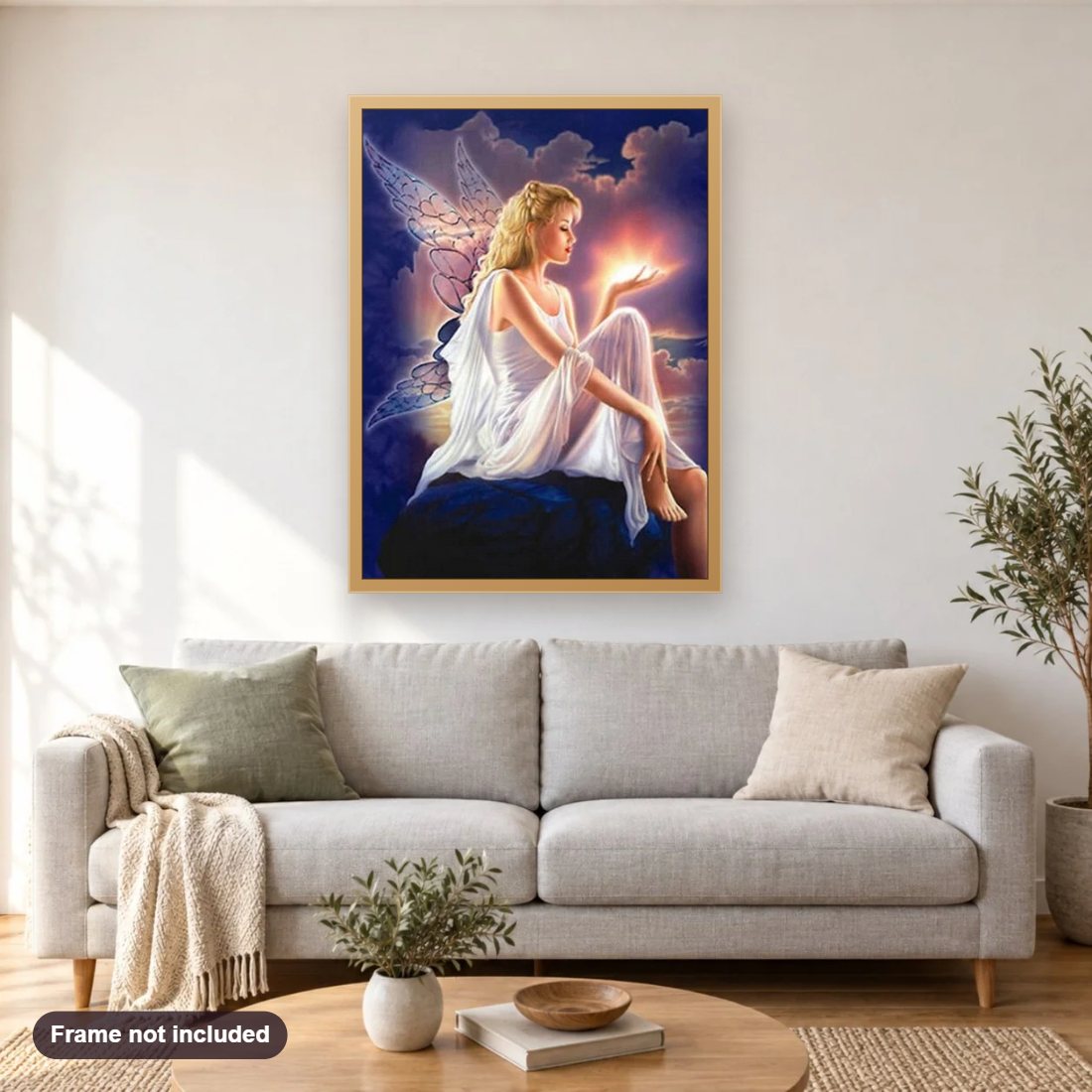 Mystical Angel diamond painting shown framed on a living room wall above a sofa