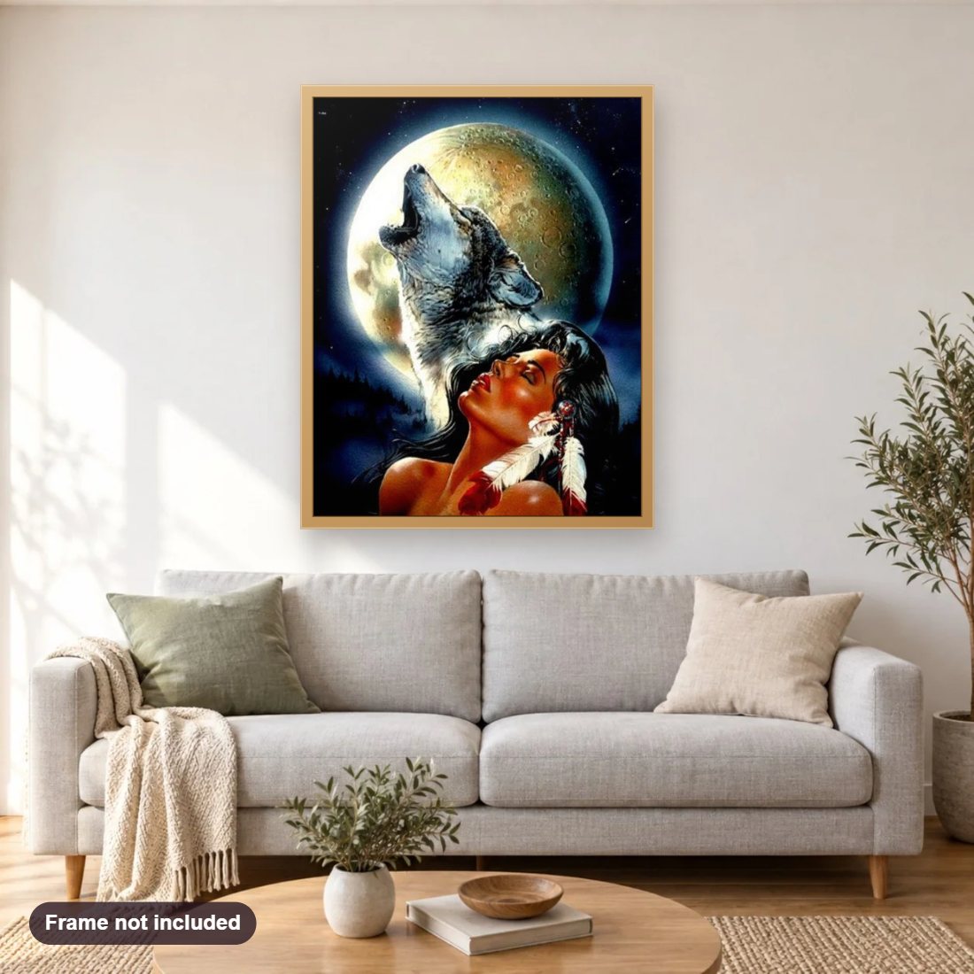 Native Woman & The Wolf diamond painting shown framed on a living room wall above a sofa