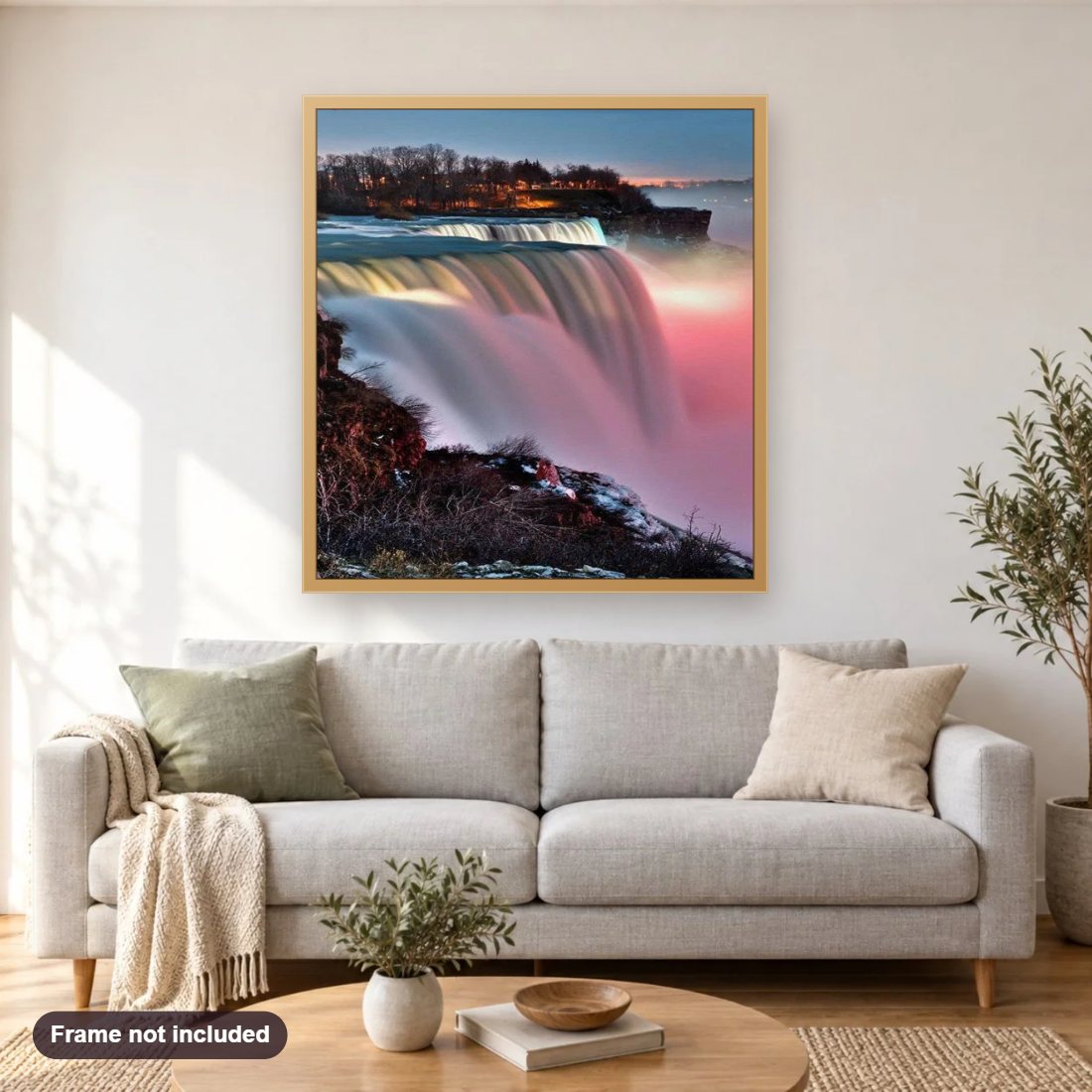 Niagara Falls diamond painting shown framed on a living room wall above a sofa