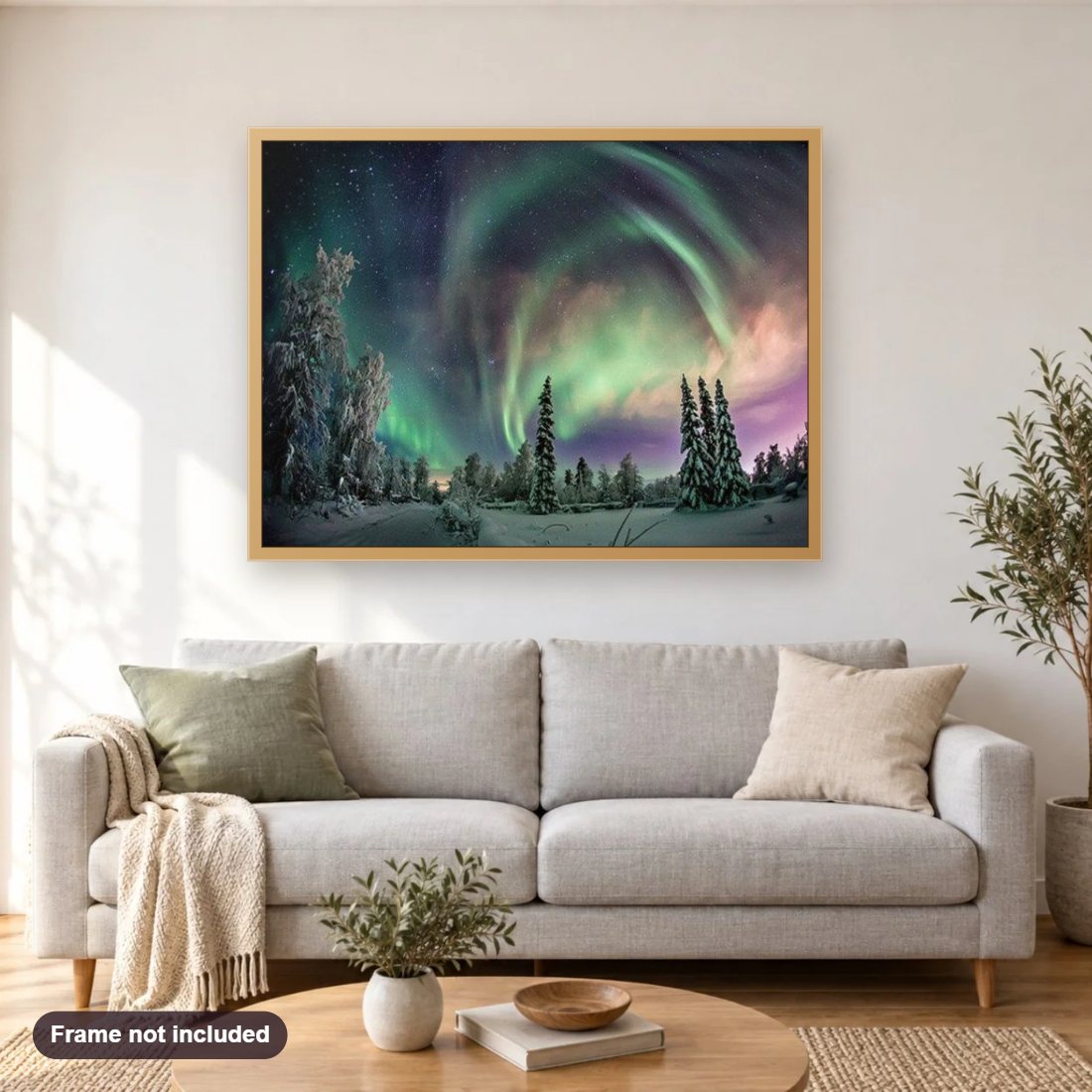 Northern Lights diamond painting shown framed on a living room wall above a sofa