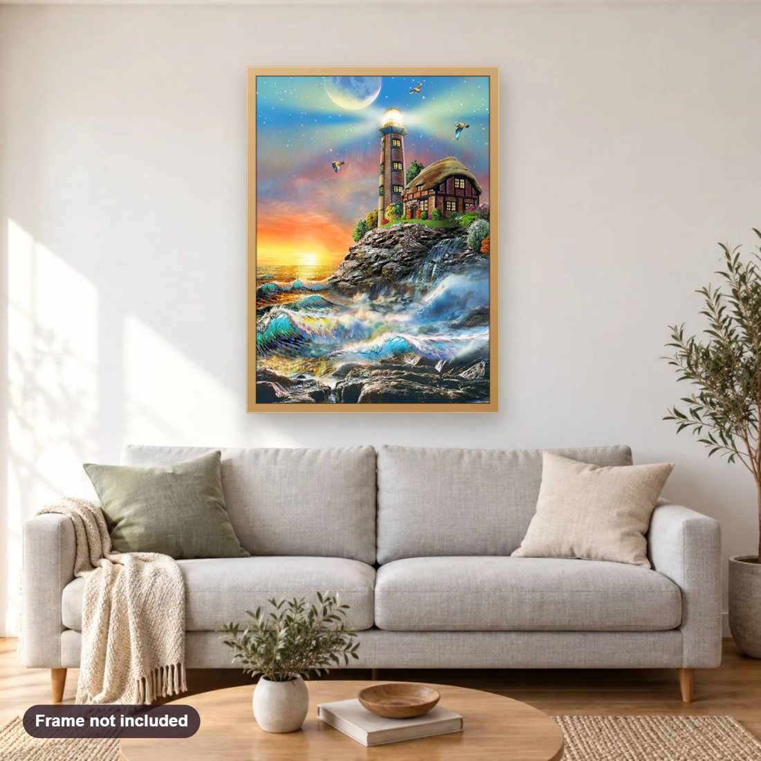 Ocean Waves & Light House diamond painting shown framed on a living room wall above a sofa