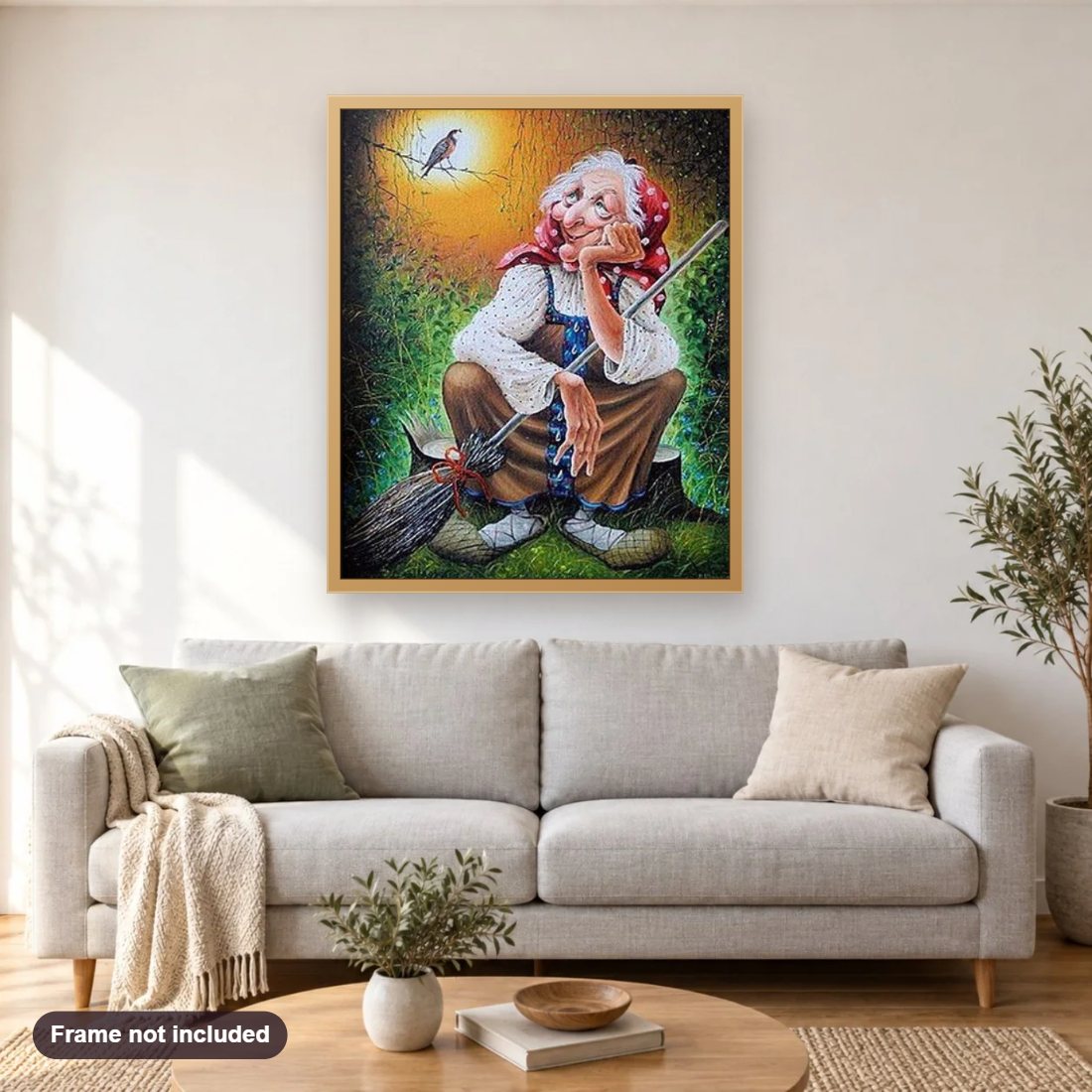 Old Witch with Broom diamond painting shown framed on a living room wall above a sofa
