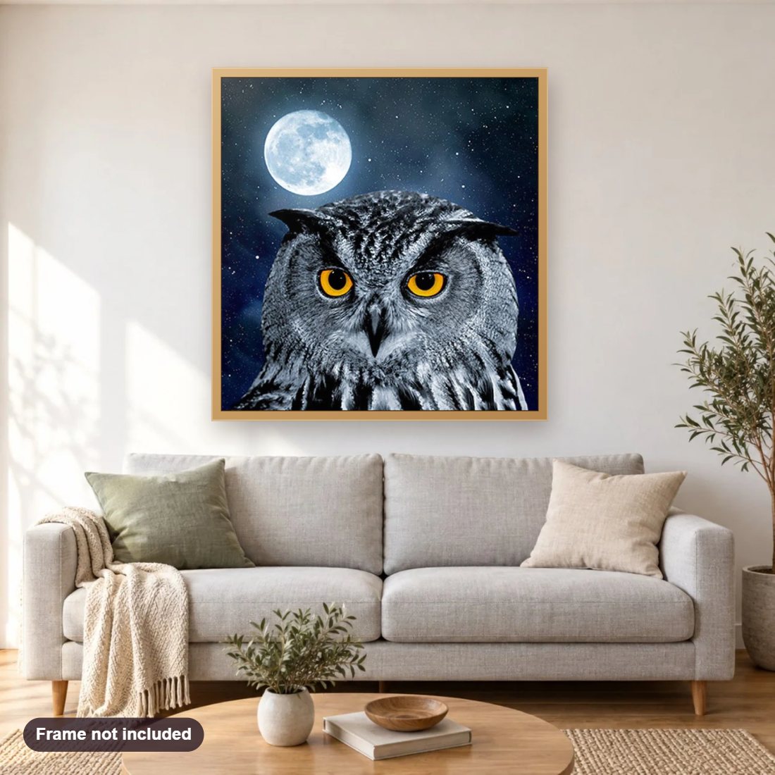 Owl & Full Moon Night diamond painting shown framed on a living room wall above a sofa