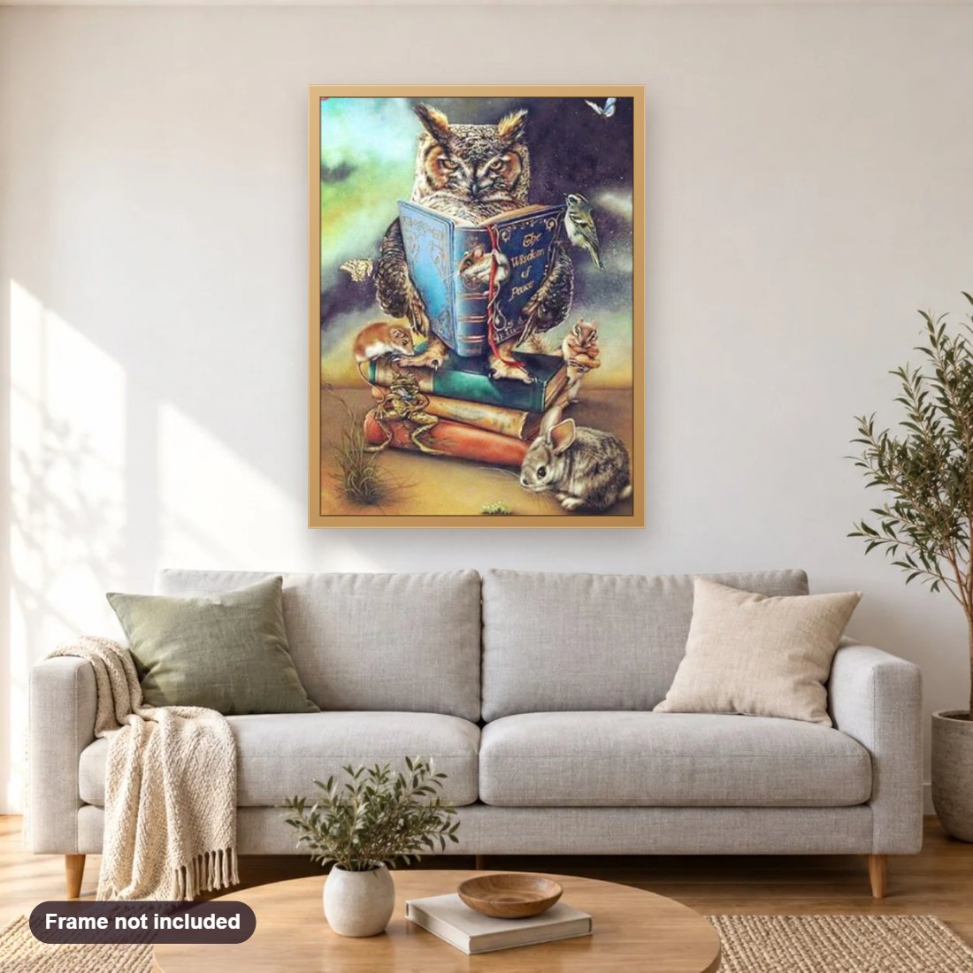 Owl Reading Book diamond painting shown framed on a living room wall above a sofa