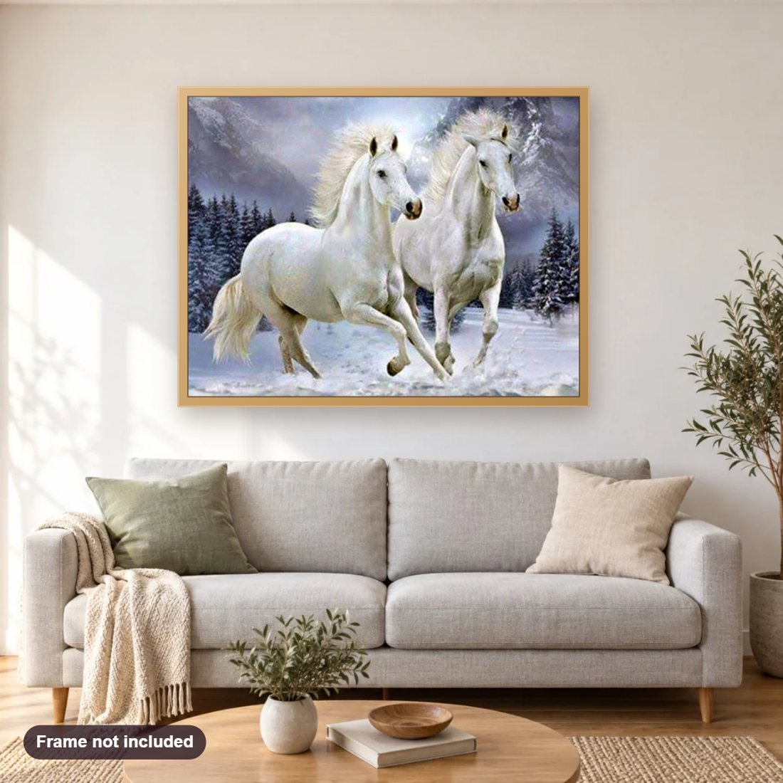Pair of White Horses diamond painting shown framed on a living room wall above a sofa