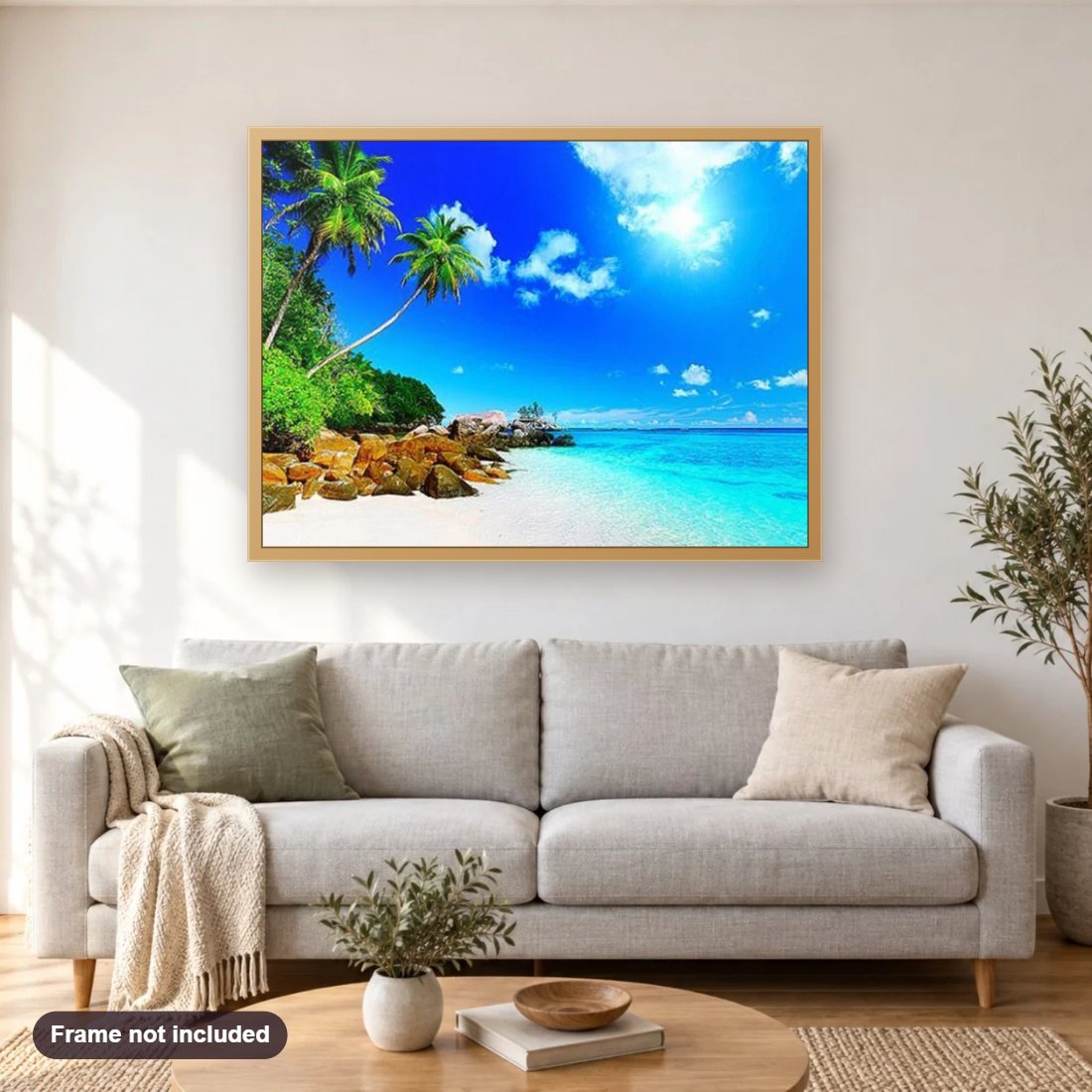 Palm Trees & Blue Ocean diamond painting shown framed on a living room wall above a sofa