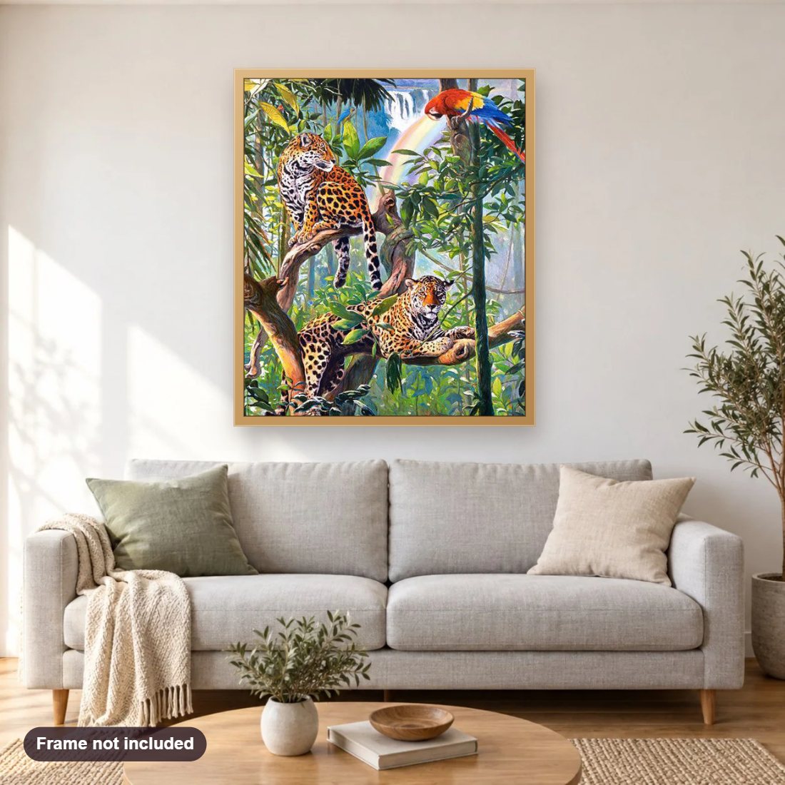 Parrot & Leopards on Trees diamond painting shown framed on a living room wall above a sofa