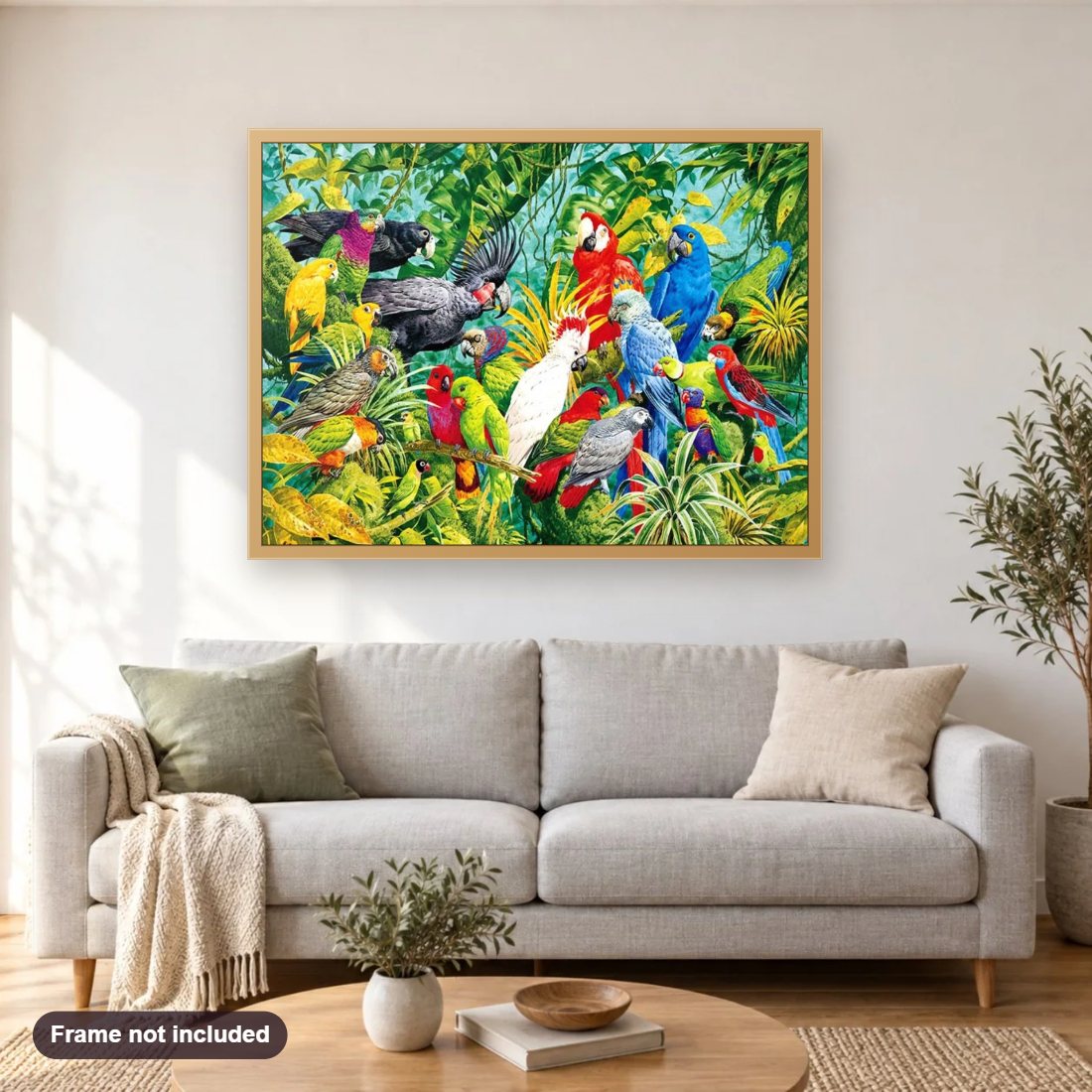 Parrots Kingdom diamond painting shown framed on a living room wall above a sofa