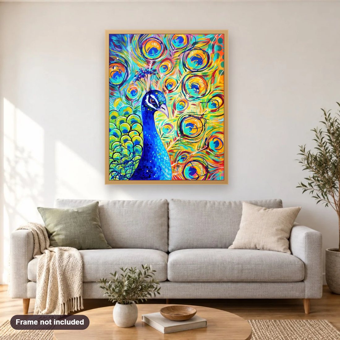 Peacock diamond painting shown framed on a living room wall above a sofa