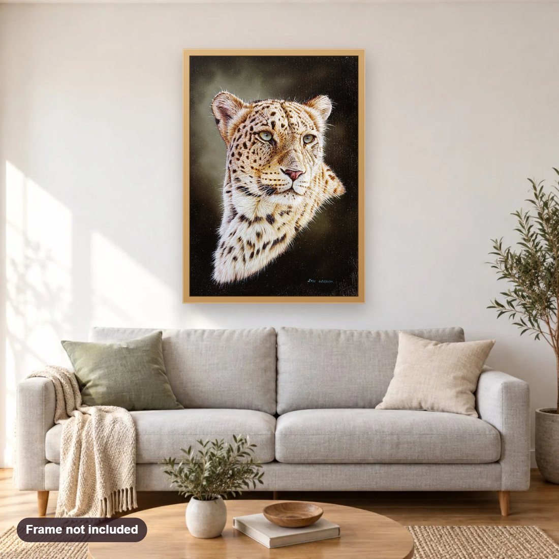 Persian Leopard Portrait diamond painting shown framed on a living room wall above a sofa