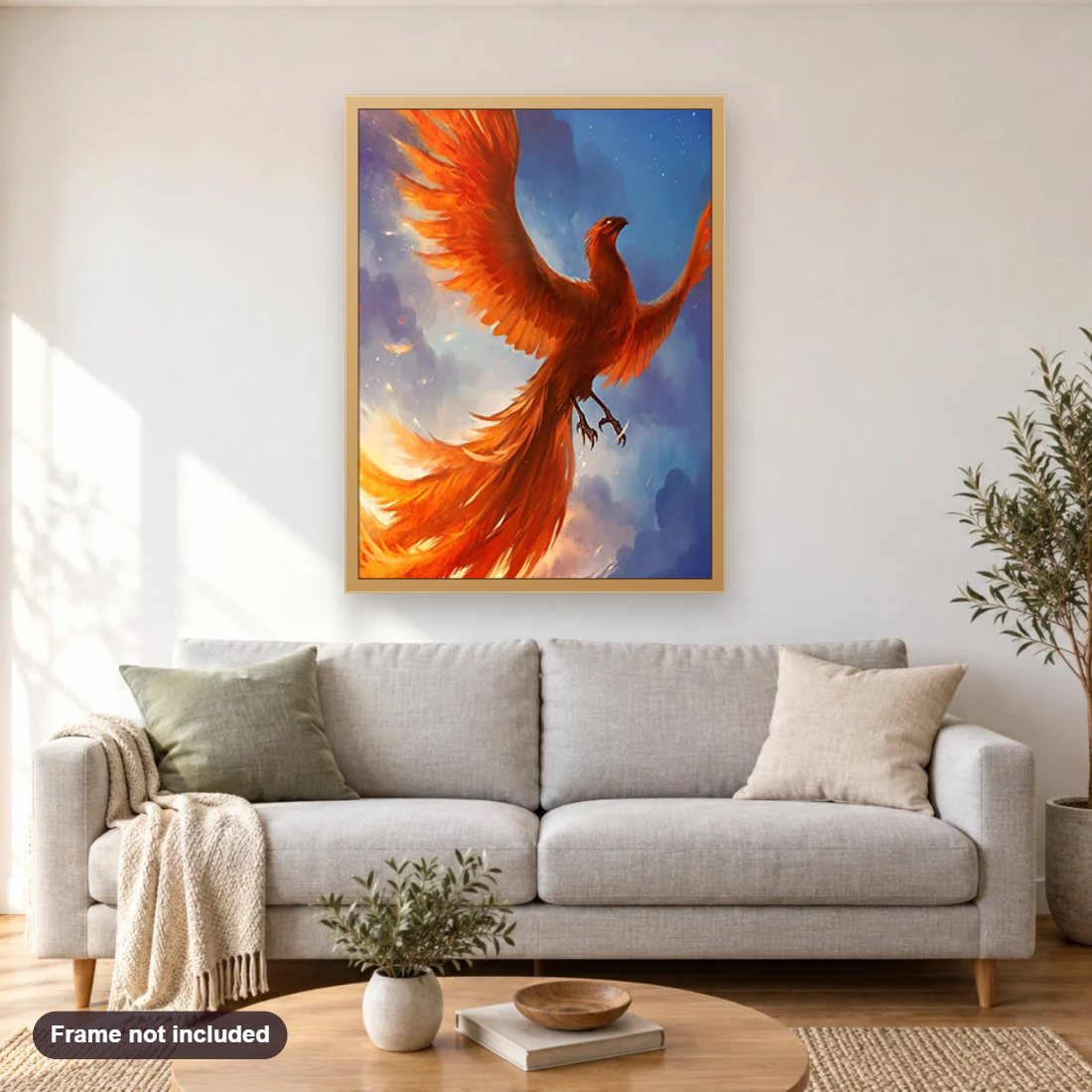 Phoenix In The Sky diamond painting shown framed on a living room wall above a sofa