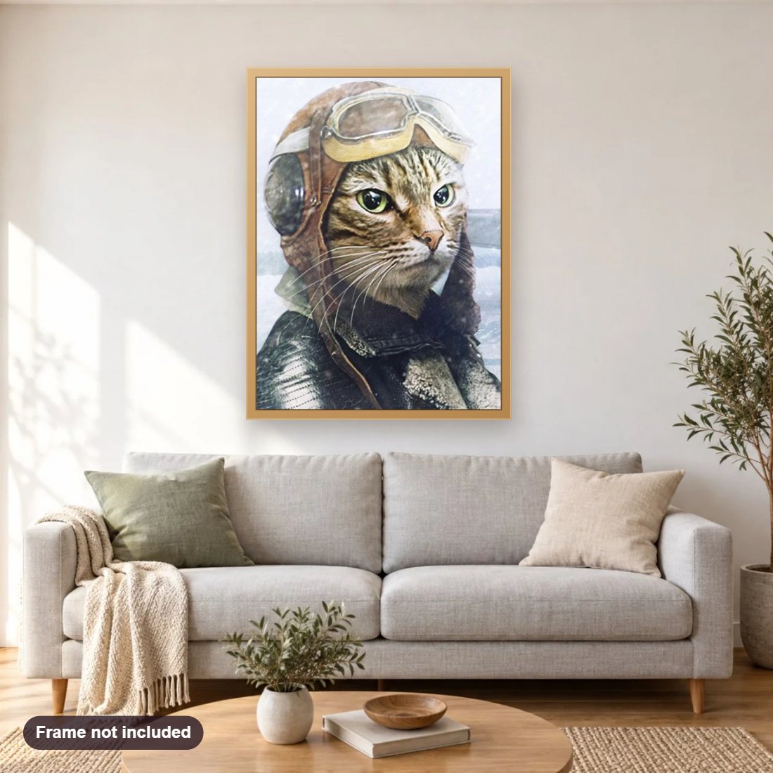 Pilot Cat diamond painting shown framed on a living room wall above a sofa