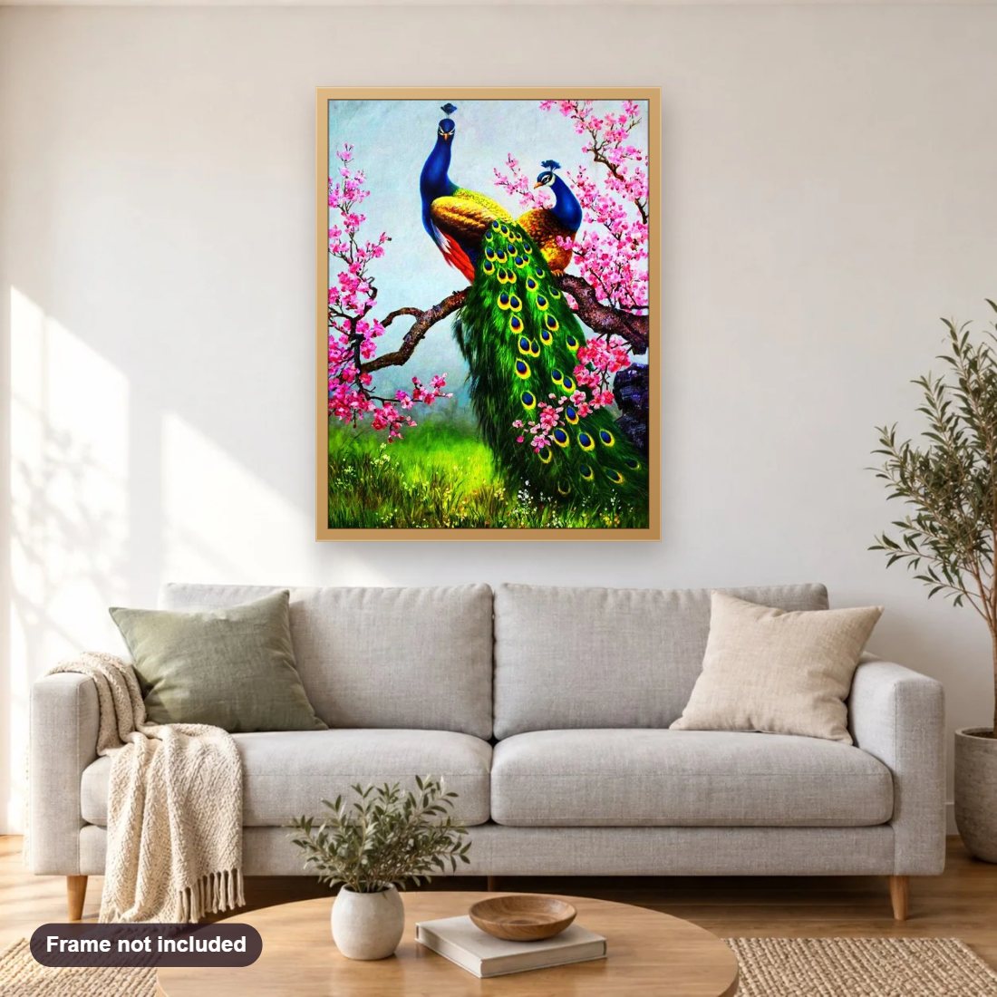 Pink Flowers & Peacocks Pair diamond painting shown framed on a living room wall above a sofa