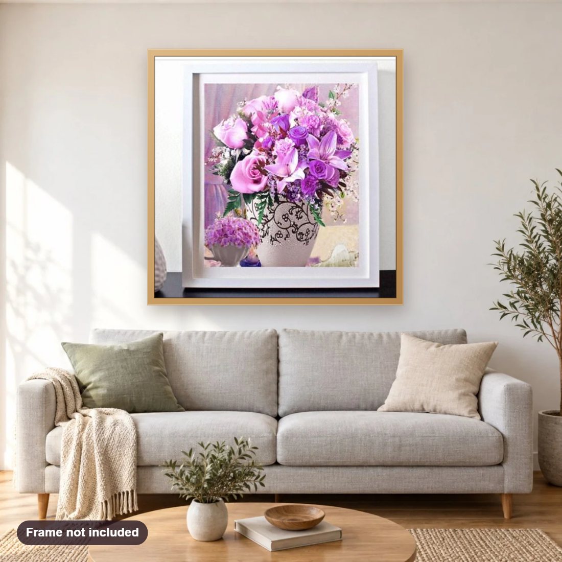 Pink & Purple Roses diamond painting shown framed on a living room wall above a sofa