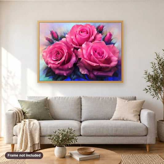 Pink Rose Beauty diamond painting shown framed on a living room wall above a sofa