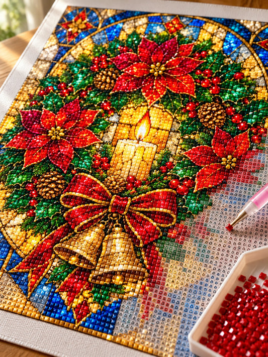 Close-up of the stained glass poinsettia Christmas wreath diamond painting in progress, square resin drills, wax pen and drill tray