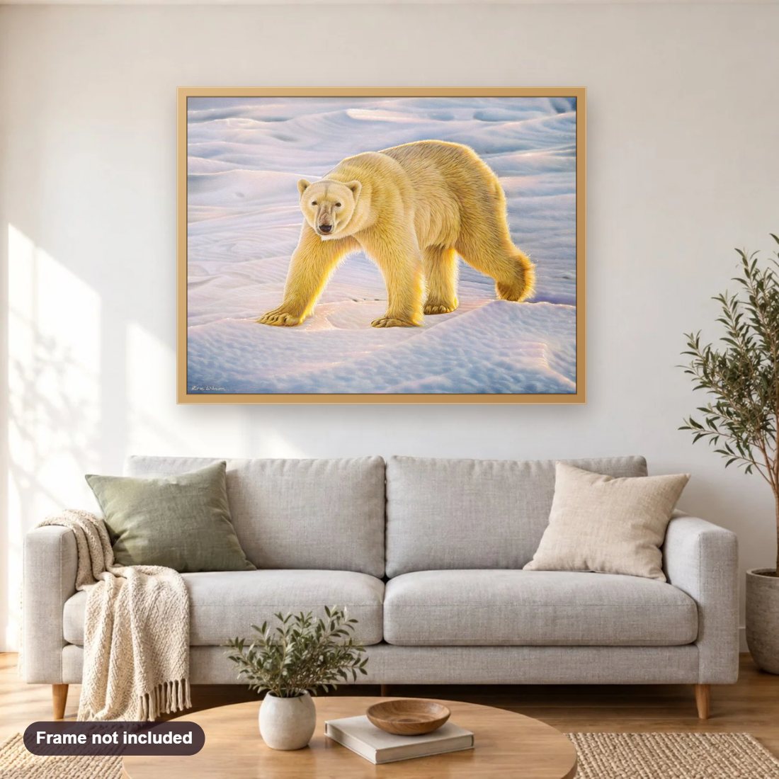 Polar Bear at Sundown diamond painting shown framed on a living room wall above a sofa