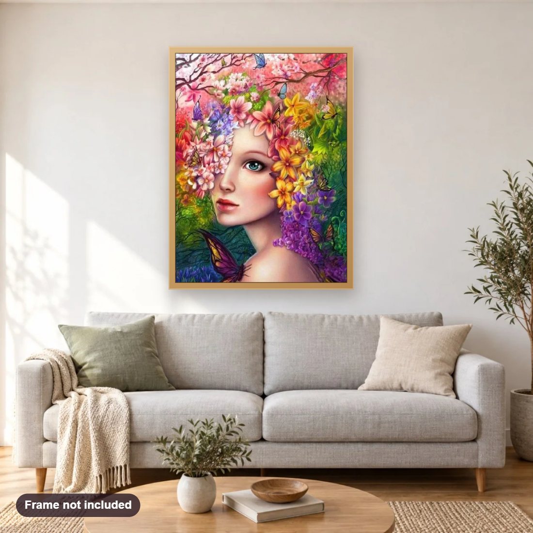 Pretty Girl with Flowers on her Head diamond painting shown framed on a living room wall above a sofa