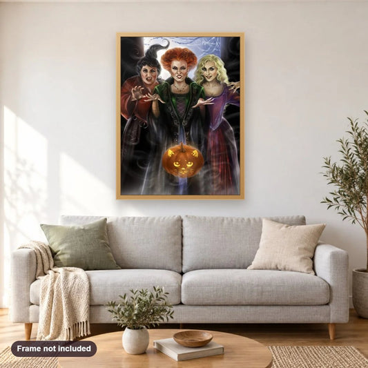 Pumpkin & Halloween Witches diamond painting shown framed on a living room wall above a sofa