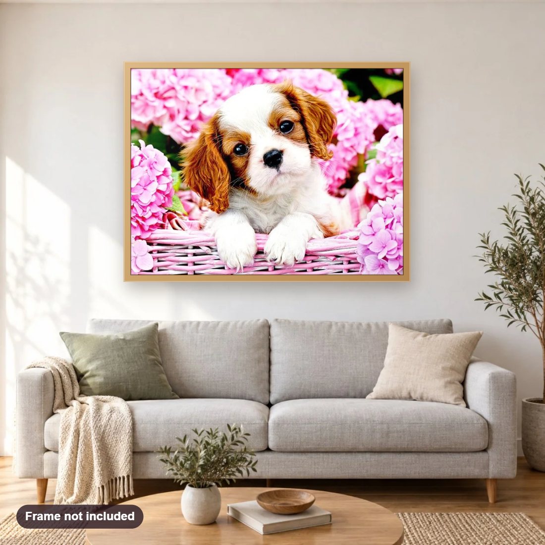 Puppy in Flower Basket diamond painting shown framed on a living room wall above a sofa