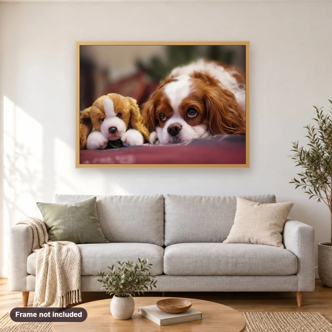 Puppy with a Stuffed Toy diamond painting shown framed on a living room wall above a sofa