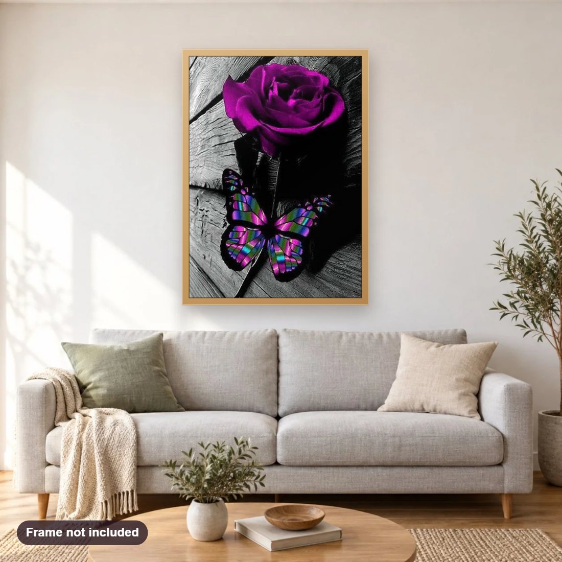 Purple Rose & Butterfly diamond painting shown framed on a living room wall above a sofa