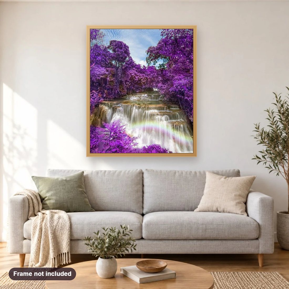 Purple Trees & Waterfall View diamond painting shown framed on a living room wall above a sofa