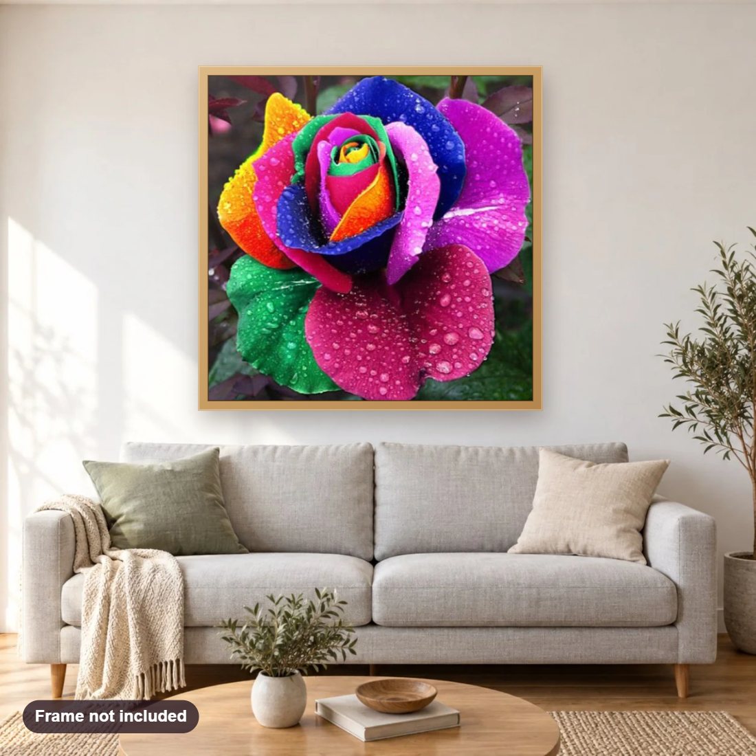 Rainbow Flower diamond painting shown framed on a living room wall above a sofa