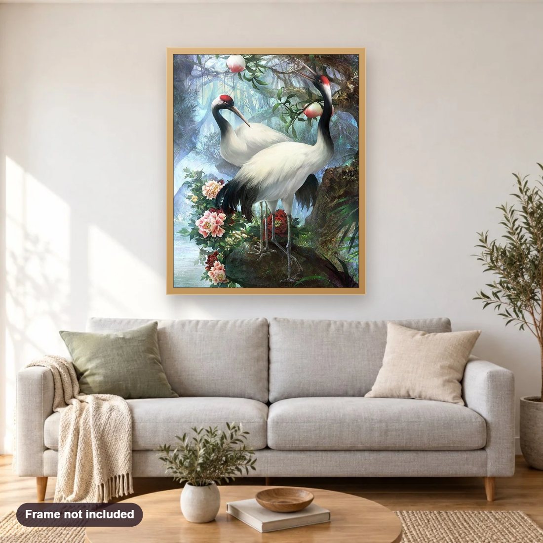Red Crowned Crane diamond painting shown framed on a living room wall above a sofa