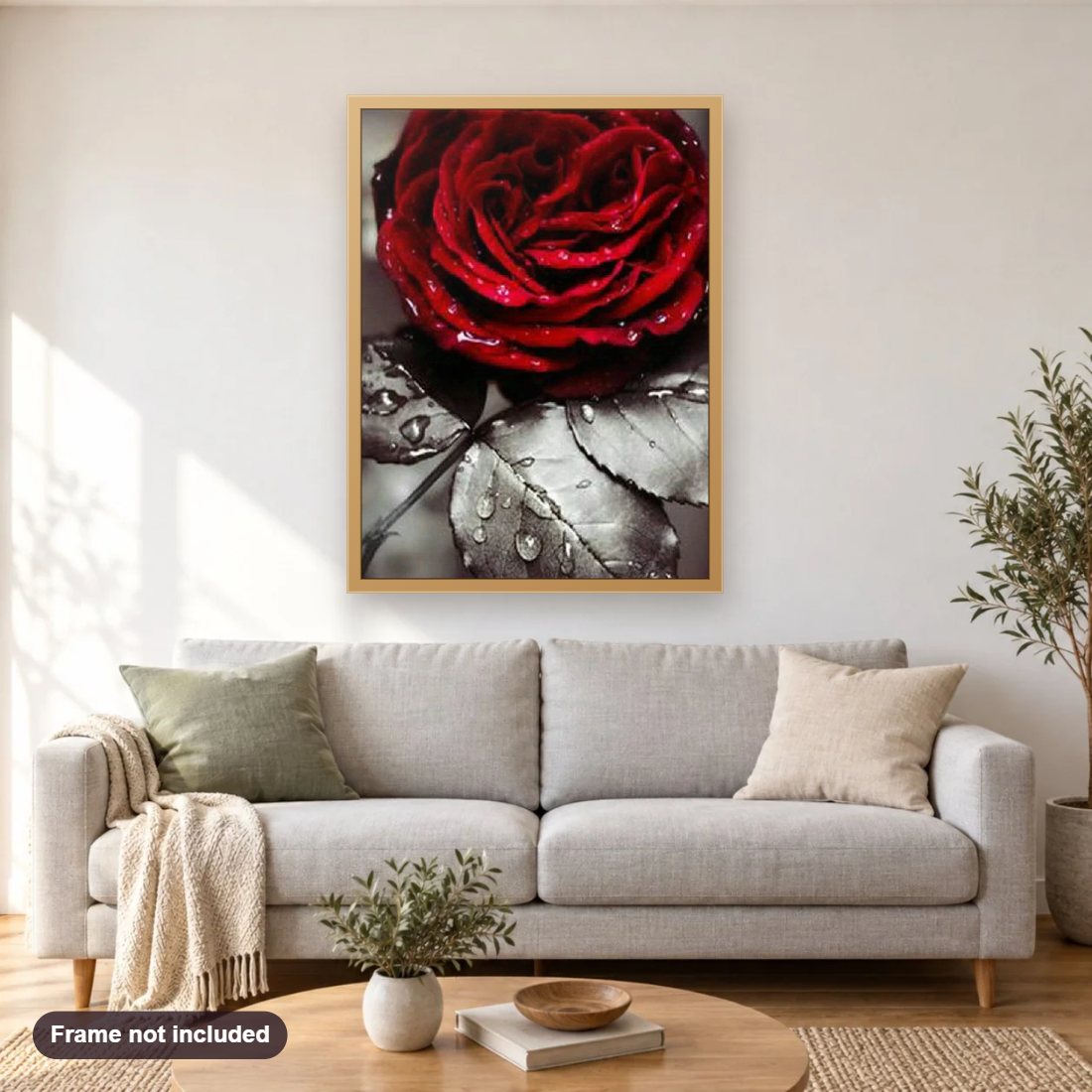 Red Rose diamond painting shown framed on a living room wall above a sofa