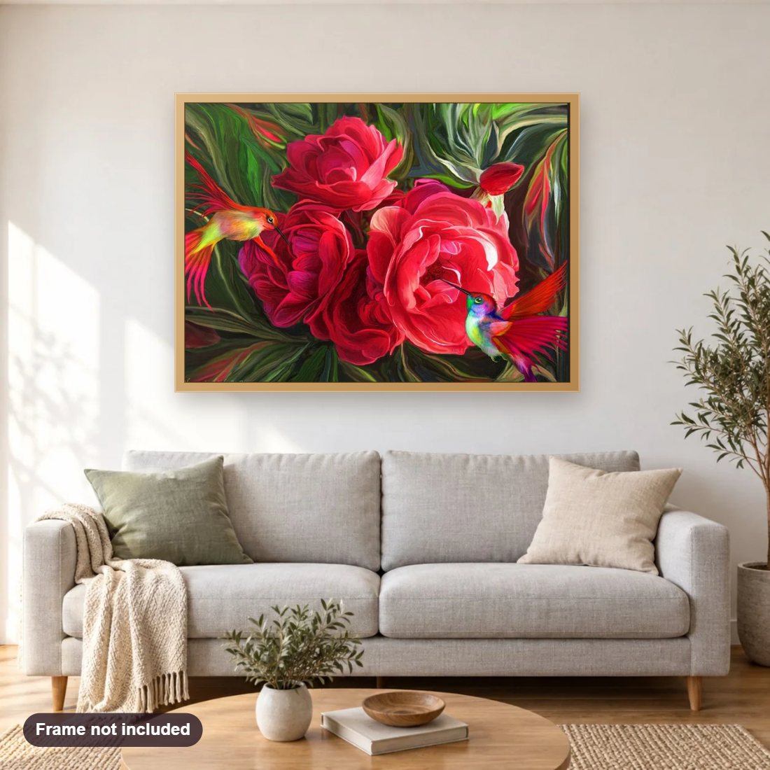 Red Roses & Humming Birds diamond painting shown framed on a living room wall above a sofa