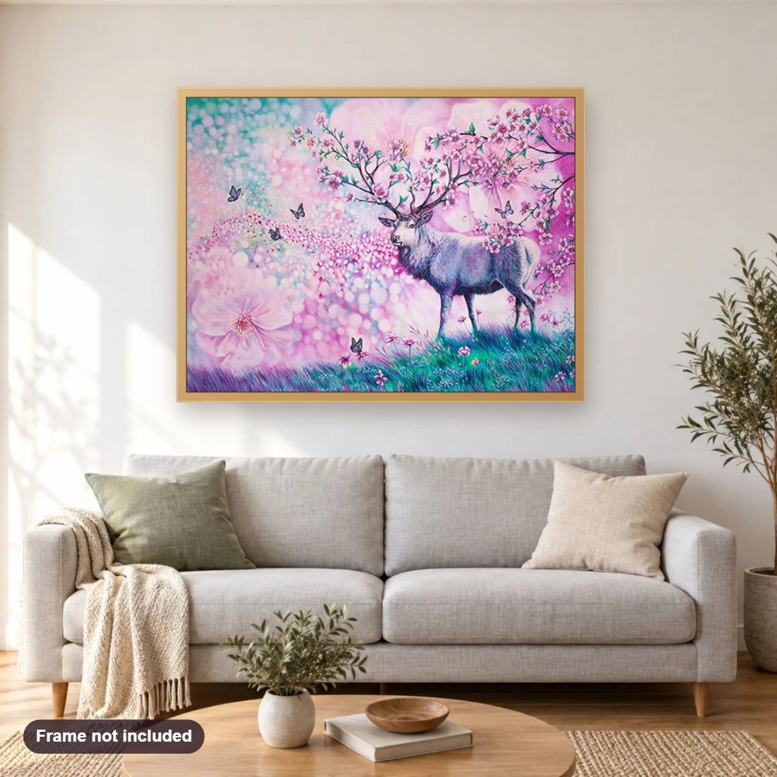 Reindeer with Floral Horns diamond painting shown framed on a living room wall above a sofa