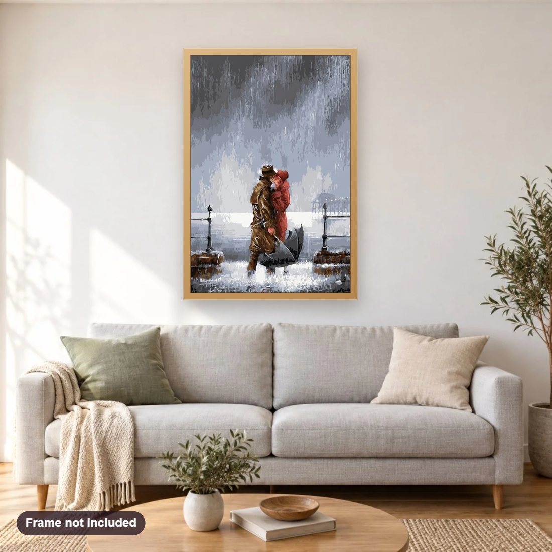 Romantic Couple Kissing in Rain diamond painting shown framed on a living room wall above a sofa