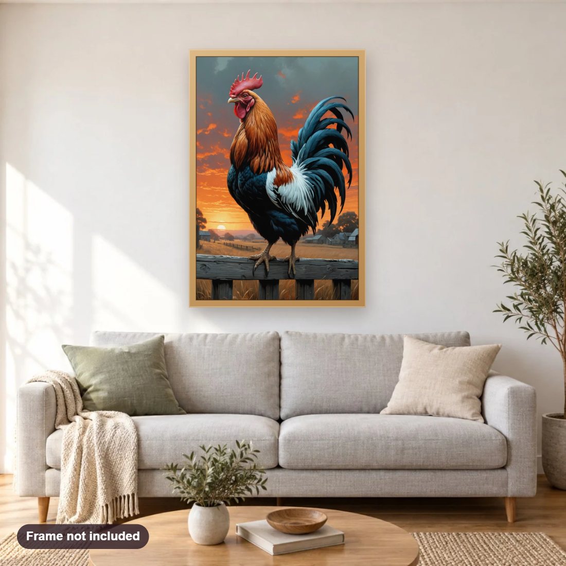 Rooster at Sunrise diamond painting shown framed on a living room wall above a sofa