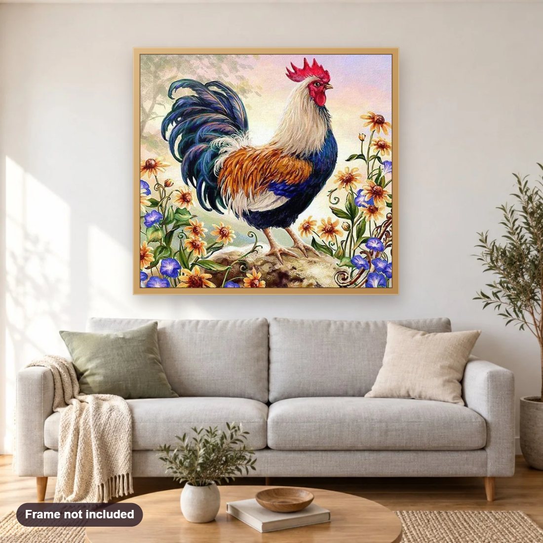 Rooster diamond painting shown framed on a living room wall above a sofa