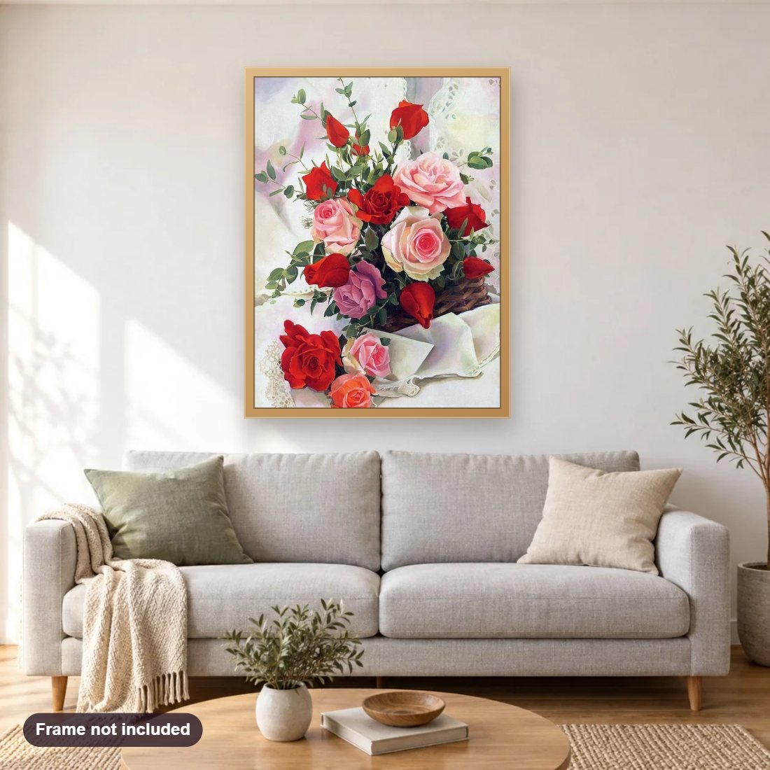 Rose Basket diamond painting shown framed on a living room wall above a sofa
