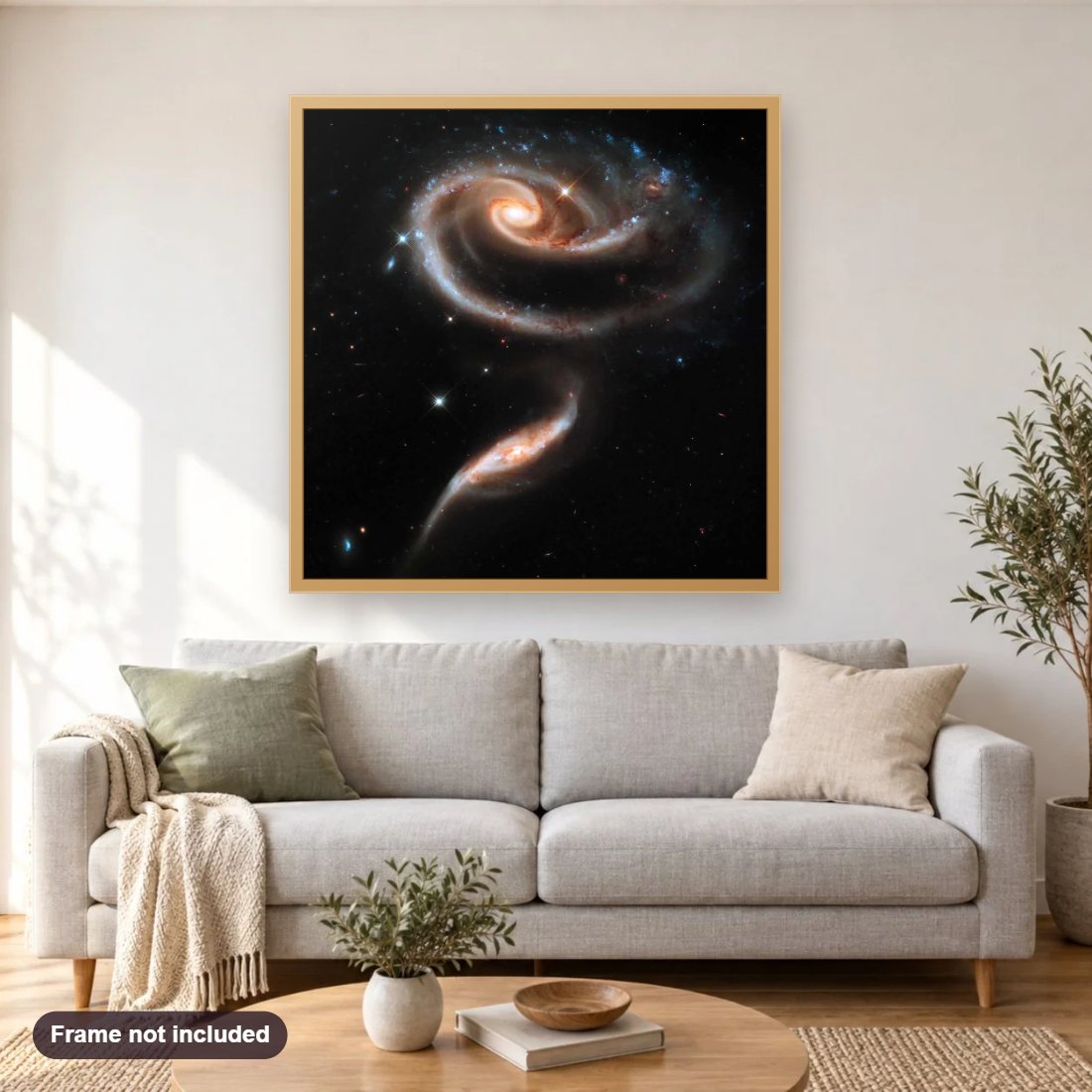 Rose Galaxies ARP 273 diamond painting shown framed on a living room wall above a sofa
