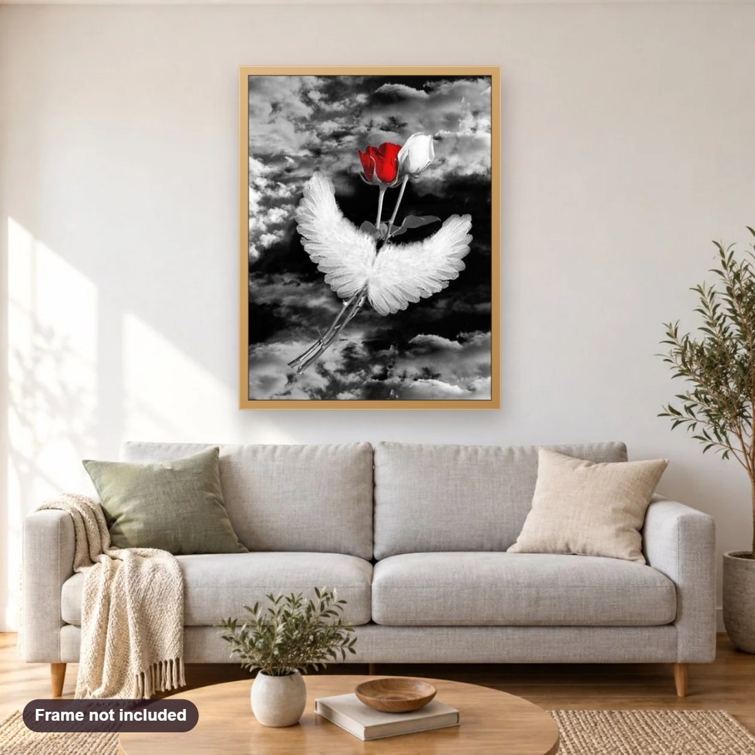 Roses & Angel Wings diamond painting shown framed on a living room wall above a sofa