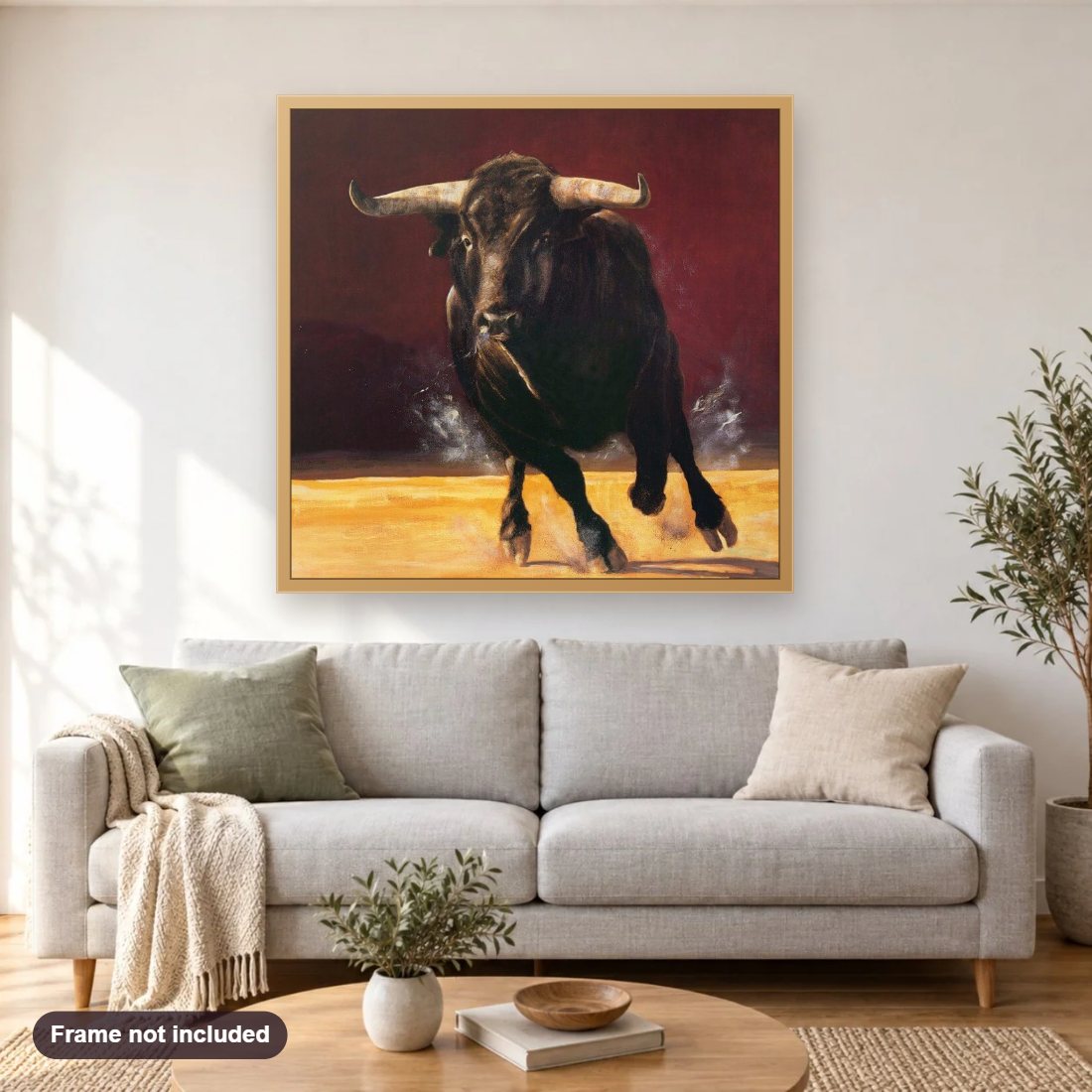 Running Bull diamond painting shown framed on a living room wall above a sofa
