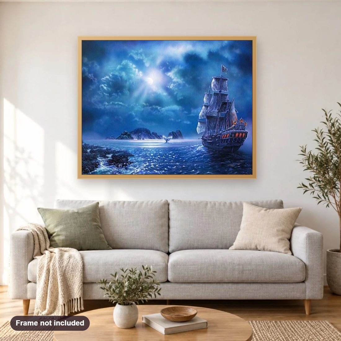 Sailing Ship at Night diamond painting shown framed on a living room wall above a sofa