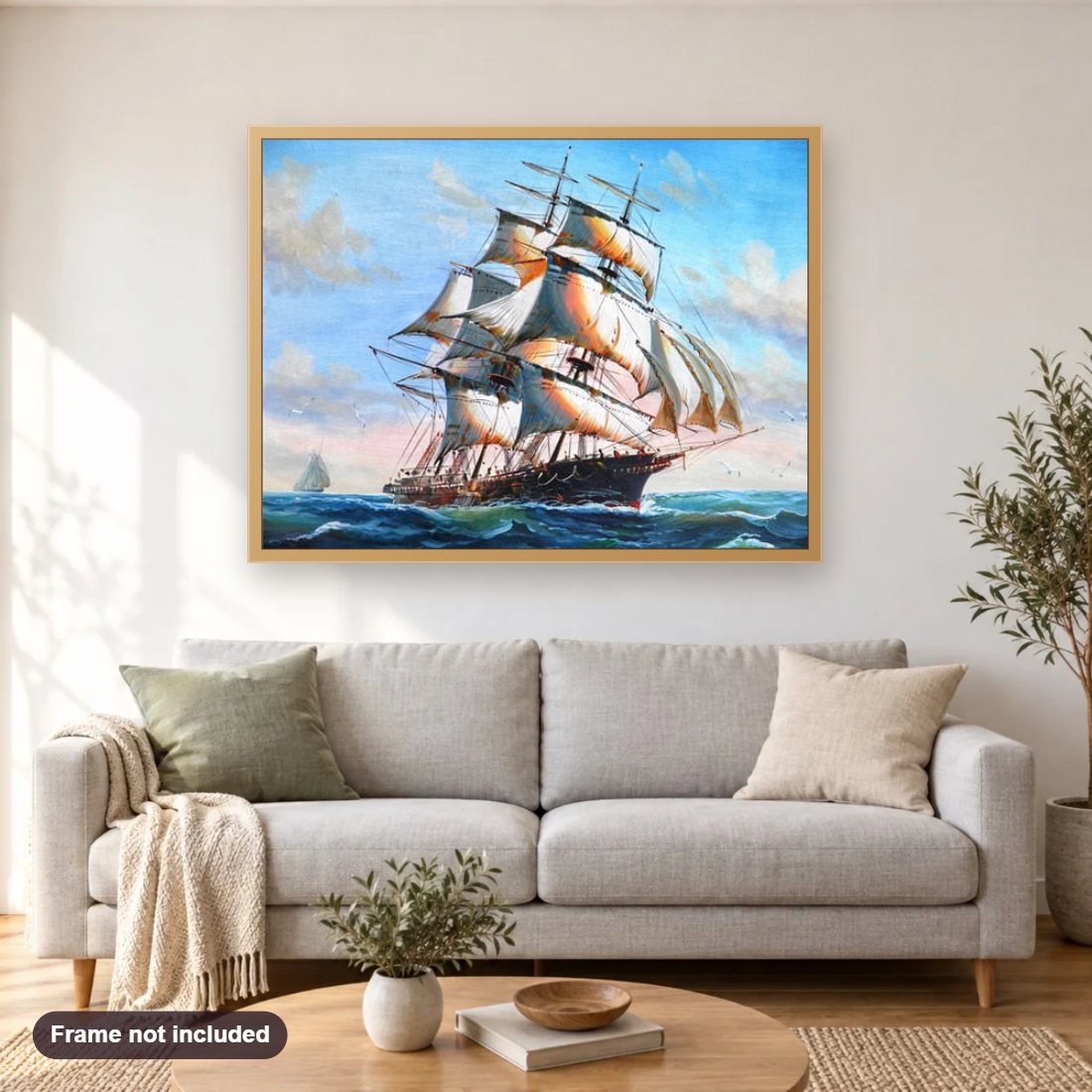 Sailing Ship diamond painting shown framed on a living room wall above a sofa