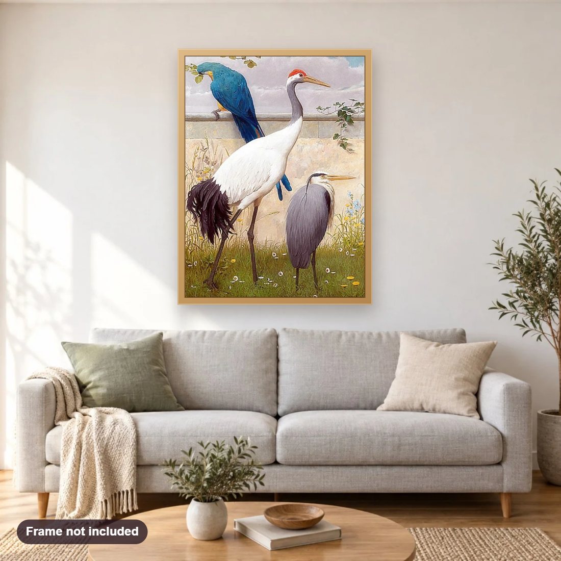 Sand Hill crane & Parrot diamond painting shown framed on a living room wall above a sofa