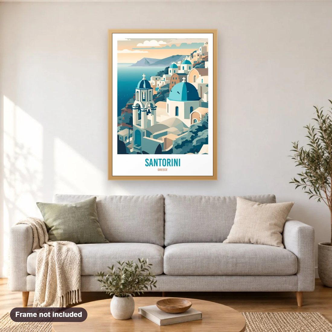 Santorini Greece diamond painting shown framed on a living room wall above a sofa