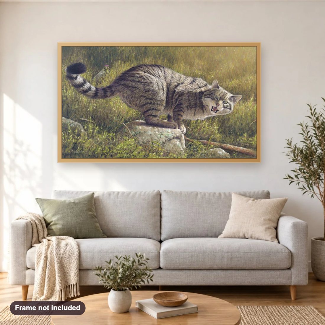 Scottish Wildcat diamond painting shown framed on a living room wall above a sofa