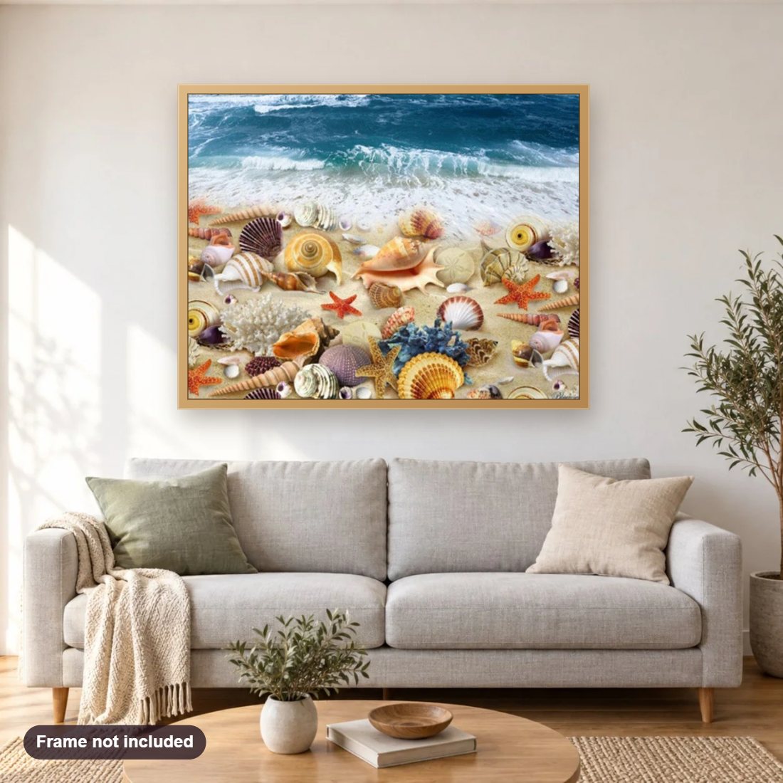 Sea Shells on the Beach diamond painting shown framed on a living room wall above a sofa