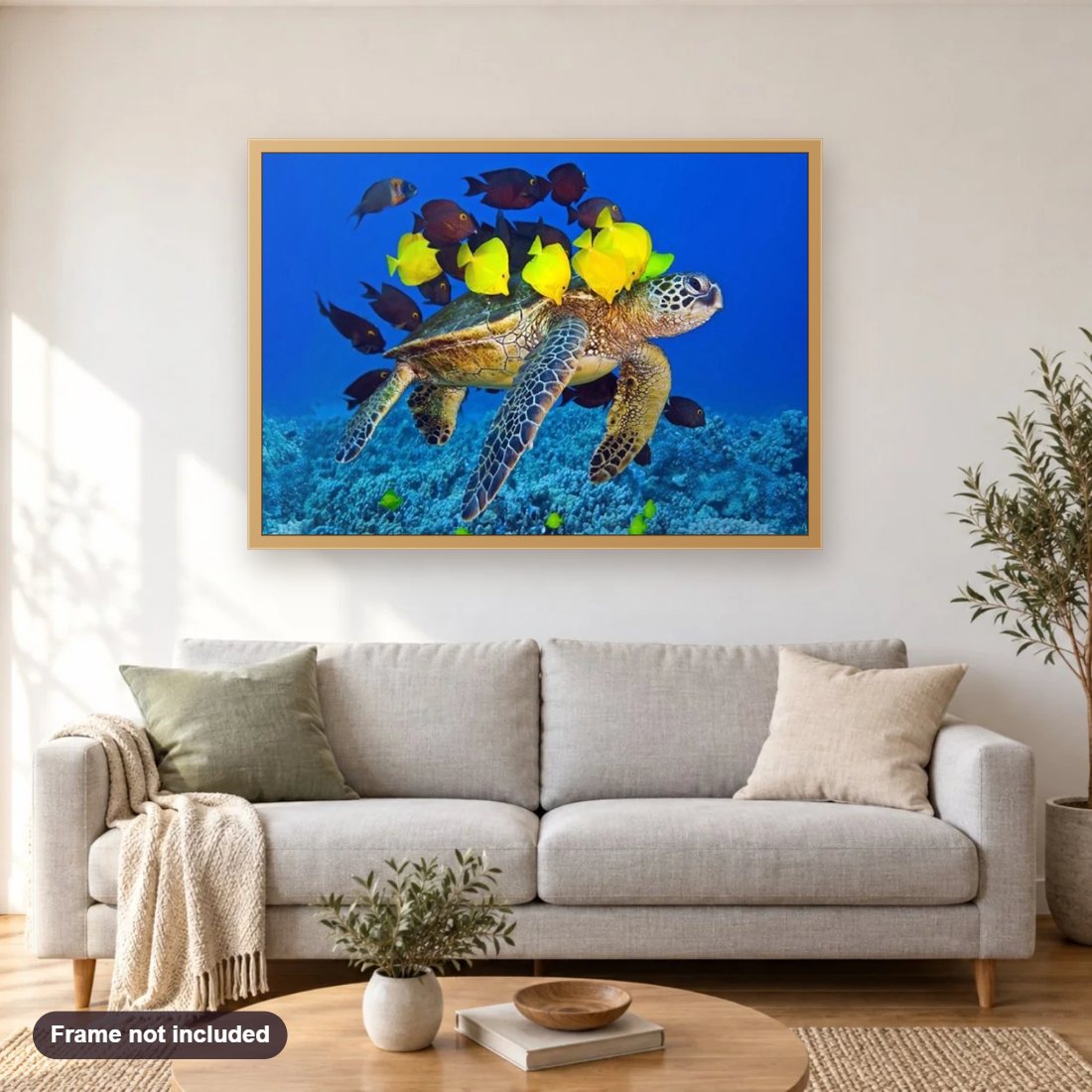 Sea Turtle & Fish diamond painting shown framed on a living room wall above a sofa