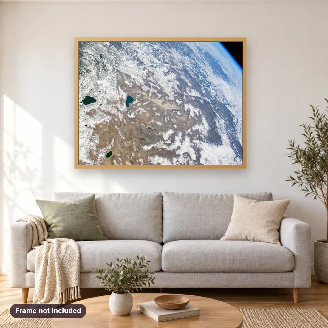 Seasons of Snow Cover in the West diamond painting shown framed on a living room wall above a sofa