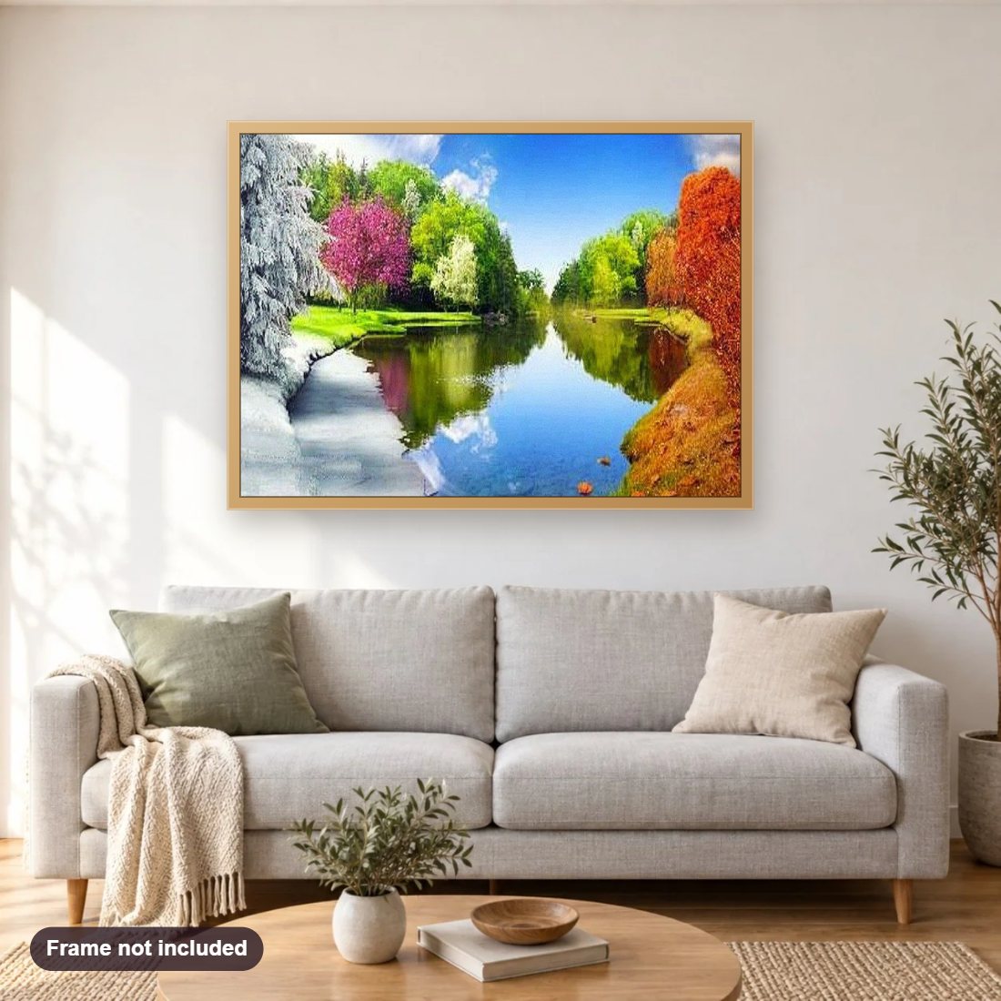 Seasons of the Year diamond painting shown framed on a living room wall above a sofa