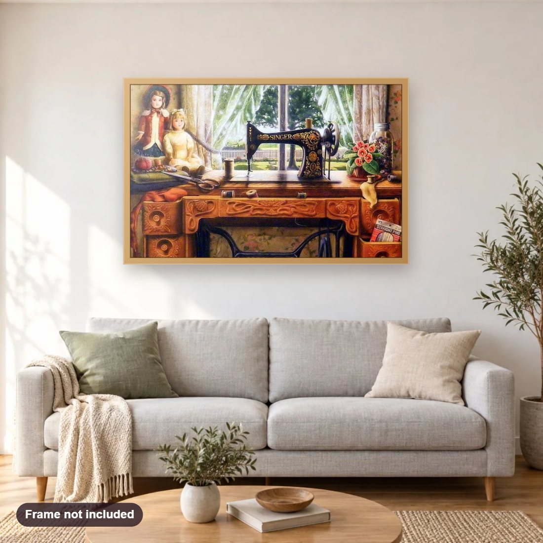 Sewing machine diamond painting shown framed on a living room wall above a sofa